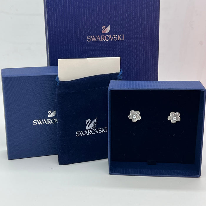 Swarovski Stud Earrings (Flower Design)
 Color: White and Silver (with a white crystal pearl and clear pavé)