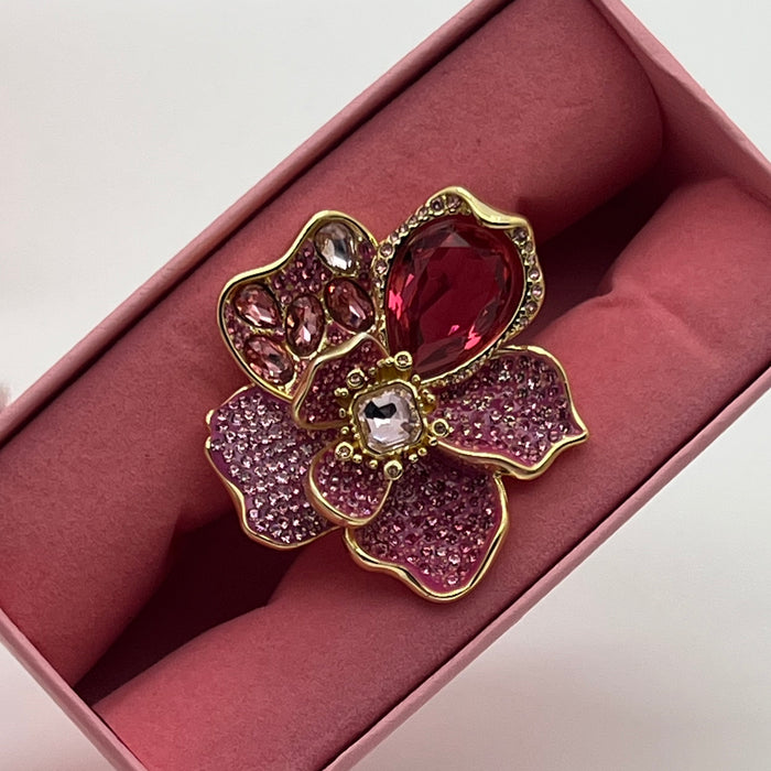 Swarovski Idyllia Pink Flower Ring  
 Color: Shades of pink and magenta with a clear/light center crystal