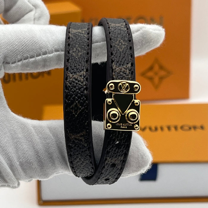 Louis Vuitton Monogram Trunk Double Bracelet  
 Color: Brown / Black / White