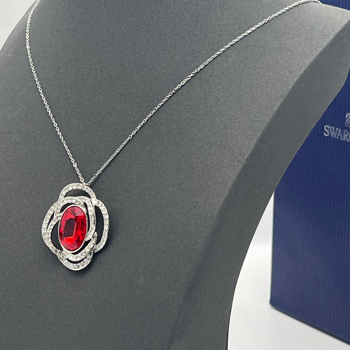 Swarovski Eternal Flower / Florere Pendant 
 Color: Silver, Clear, and Ruby Red/Midnight Blue