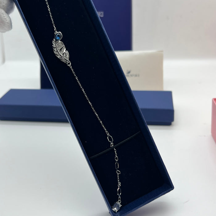 Swarovski Nice Feather Station Bracelet  
 Color: Silver and Dark Blue with Clear Pavé Crystals