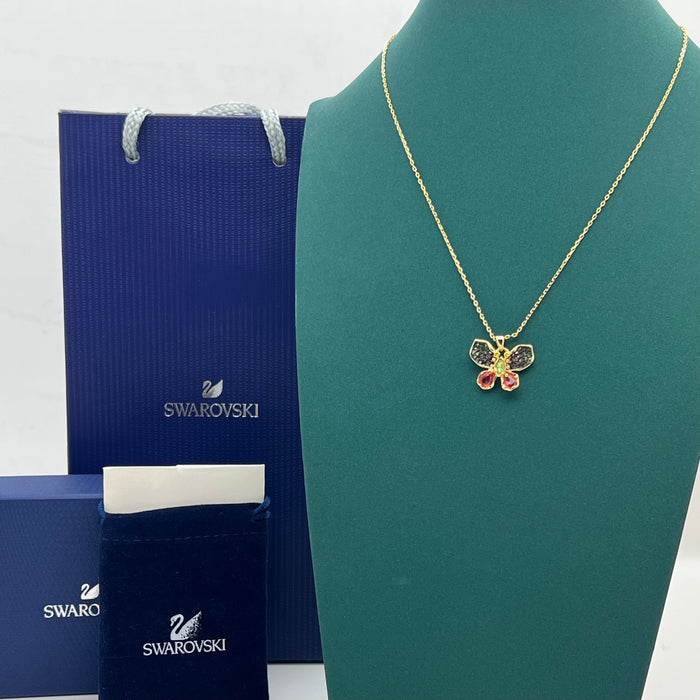 Swarovski Butterfly Pendant Necklace  
 Color: Gold with multicolored crystals (green, pink, purple, and yellow accents)