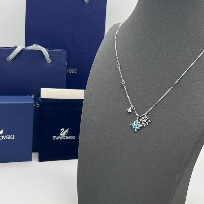 Swarovski Constella or Star Multi-Charm Pendant Necklace  
 Color: Silver with light blue and clear crystals