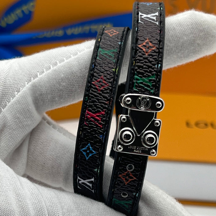 Louis Vuitton Monogram Trunk Double Bracelet  
 Color: Brown / Black / White