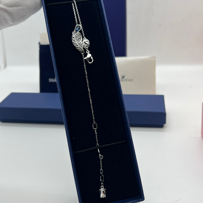 Swarovski Nice Feather Station Bracelet  
 Color: Silver and Dark Blue with Clear Pavé Crystals