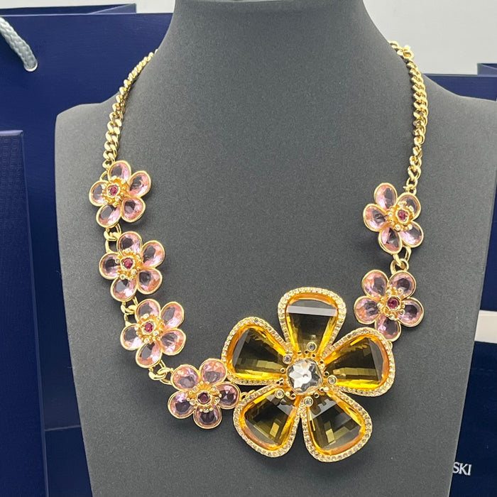 Swarovski Idyllia Large Floral Statement Necklace / Amber & Pink Crystal Flower Necklace
 Color: Gold-tone with amber yellow and soft pink crystals