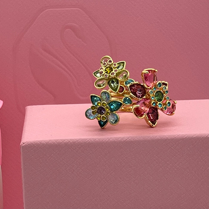 Swarovski Idyllia Cluster Flower Ring  
 Color: Multicolored (featuring vibrant shades of pink, turquoise blue, olive green, and yellow)