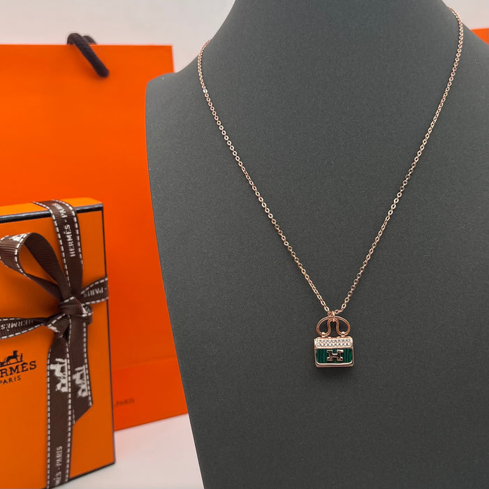 Hermès Amulettes Constance Pendant Necklace  
 Color:green / Black / red/ivory(rose gold tone)