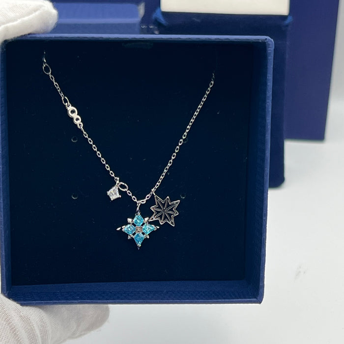 Swarovski Constella or Star Multi-Charm Pendant Necklace  
 Color: Silver with light blue and clear crystals