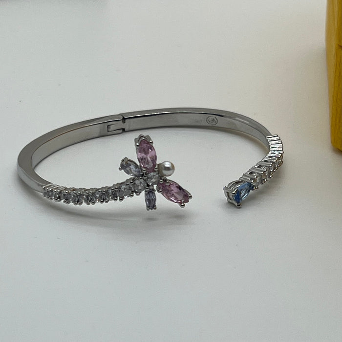 Swarovski Idyllia Butterfly & Pearl Open Bangle / Crystal Insect Cuff  
 Color: Silver-tone with pink, white (crystals and crystal pearl), and pale blue stones