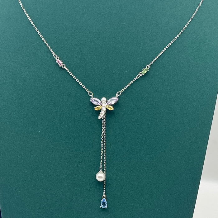 Swarovski Mixed Cuts Dragonfly Y-Necklace  
 Color: Multicolored (Silver-tone chain with pastel pink, purple, yellow, white pearl, and blue crystal accents