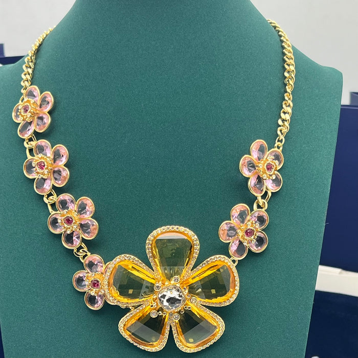 Swarovski Idyllia Large Floral Statement Necklace / Amber & Pink Crystal Flower Necklace
 Color: Gold-tone with amber yellow and soft pink crystals