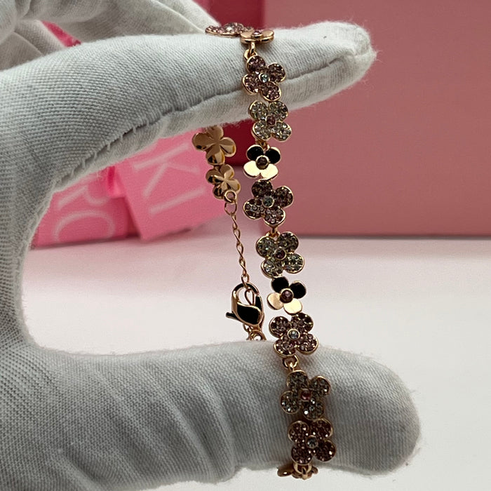 swarovski crystal Blossom Cluster Bracelet  
 Color: Rose Gold with Multicolored Crystals (Pink, Smokey, and Clear tones