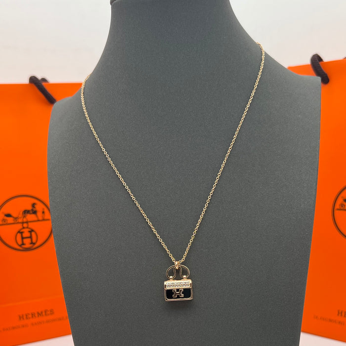 Hermès Amulettes Constance Pendant Necklace  
 Color:green / Black / red/ivory(rose gold tone)