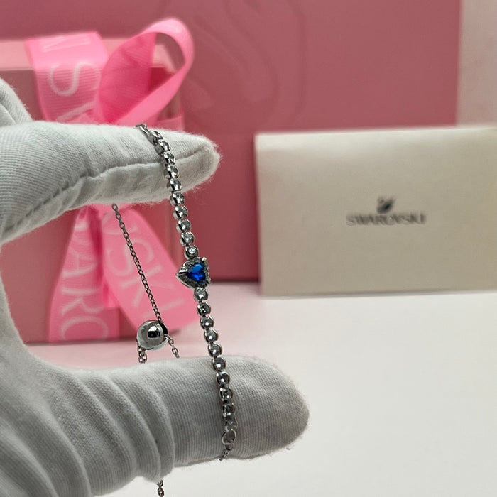 Swarovski Blue Heart Tennis Bracelet  
 Color: Silver and Deep Blue with Clear Crystals
