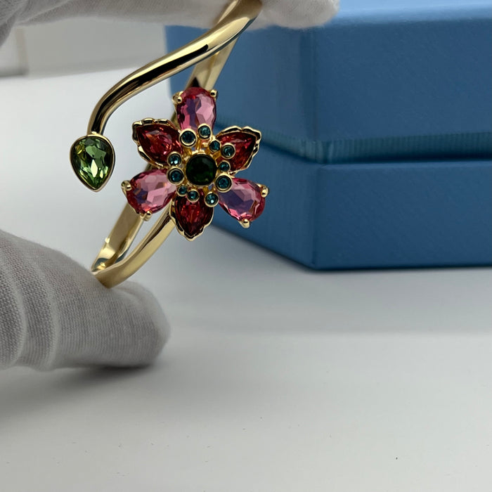 Swarovski Idyllia Floral Wrap Bangle / Flower and Leaf Cuff  
 Color: Gold-tone with pink, dark red, and green crystals