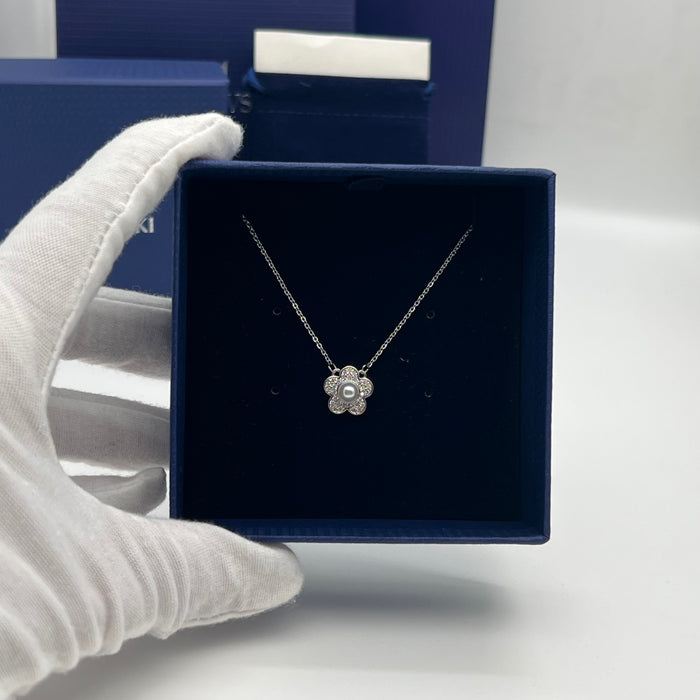 Swarovski Floral Pearl Pendant Necklace  
 Color: Silver with a white crystal pearl and clear crystal pavé