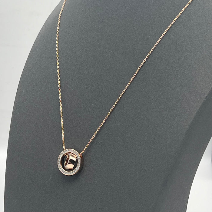 Swarovski Infinity / Twist / Generation Pendant Necklace  
 Color: Rose Gold and Clear
