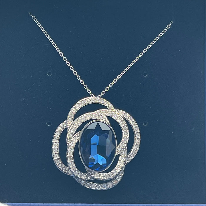 Swarovski Eternal Flower / Florere Pendant 
 Color: Silver, Clear, and Ruby Red/Midnight Blue