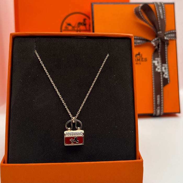 Hermès Amulettes Constance Pendant Necklace  
 Color:green / Black / red/ivory(rose gold tone)