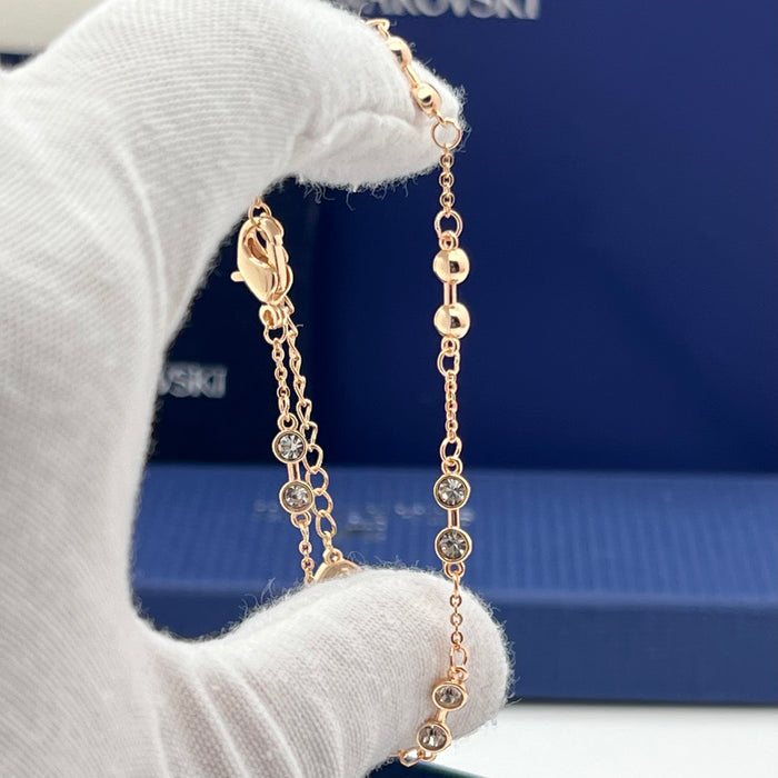 Swarovski Stranded Station Bracelet
 Color: Silver-tone and Rose Gold-tone with bezel-set clear crystals