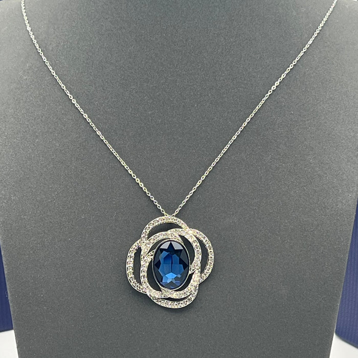 Swarovski Eternal Flower / Florere Pendant 
 Color: Silver, Clear, and Ruby Red/Midnight Blue