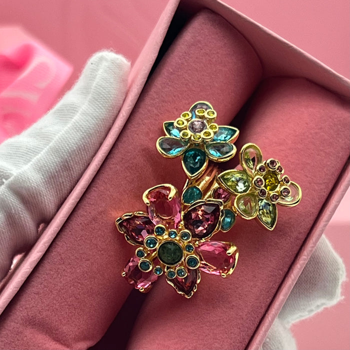 Swarovski Idyllia Cluster Flower Ring  
 Color: Multicolored (featuring vibrant shades of pink, turquoise blue, olive green, and yellow)