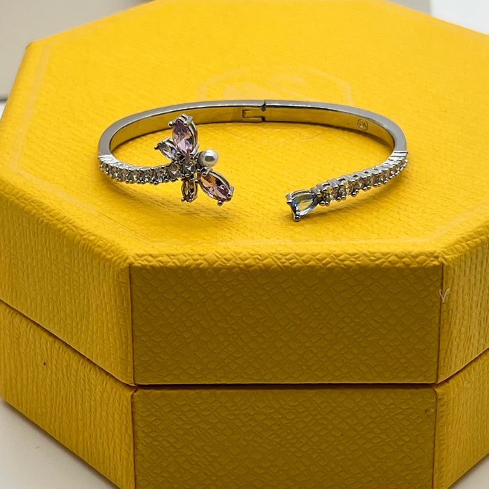 Swarovski Idyllia Butterfly & Pearl Open Bangle / Crystal Insect Cuff  
 Color: Silver-tone with pink, white (crystals and crystal pearl), and pale blue stones