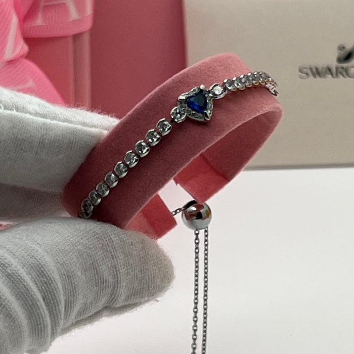 Swarovski Blue Heart Tennis Bracelet  
 Color: Silver and Deep Blue with Clear Crystals