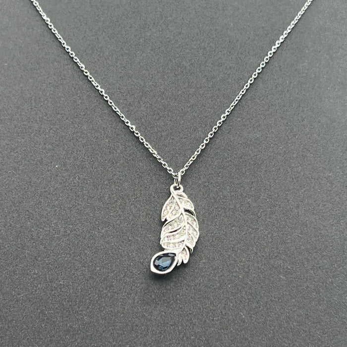 Swarovski Vienna Feather Pendant
 Color: Silver, White, and Dark Blue / Midnight Navy Accents