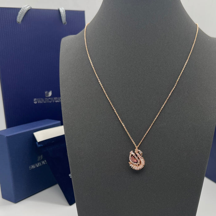 Swarovski Iconic Swan Pendant (Rose Gold & Red/Pink Crystal Edition)  
 Color: Rose Gold, Clear, and Red/Burgundy