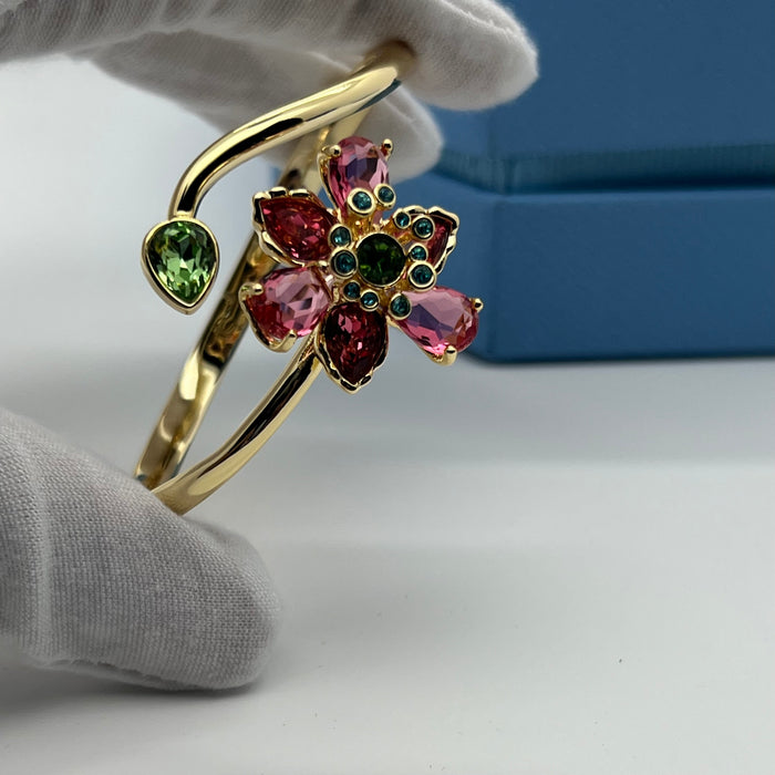 Swarovski Idyllia Floral Wrap Bangle / Flower and Leaf Cuff  
 Color: Gold-tone with pink, dark red, and green crystals