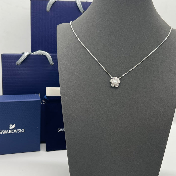 Swarovski Floral Pearl Pendant Necklace  
 Color: Silver with a white crystal pearl and clear crystal pavé