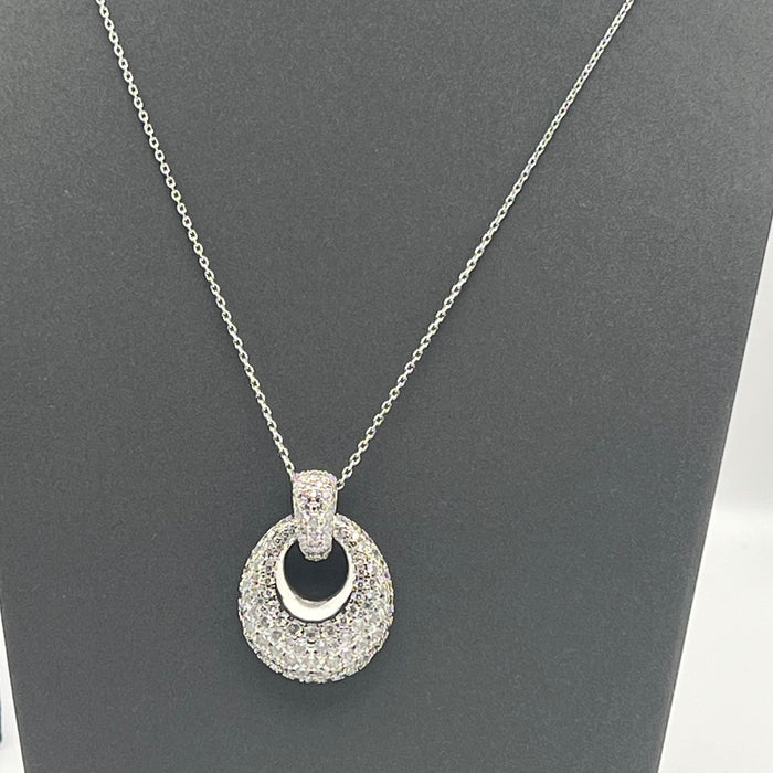 Swarovski Further / Una Pavé Circle Pendant Necklace  
 Color: Silver and Clear
