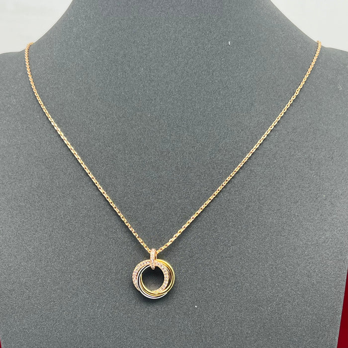 Trinity Necklace  
 Color: Gold / Multi-gold tones