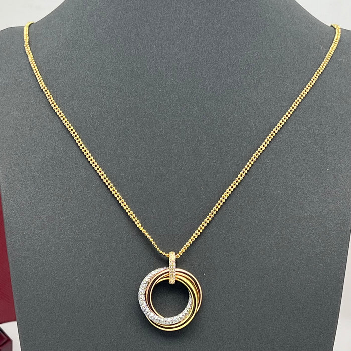 Trinity Necklace  
 Color: Gold / Multi-gold tones