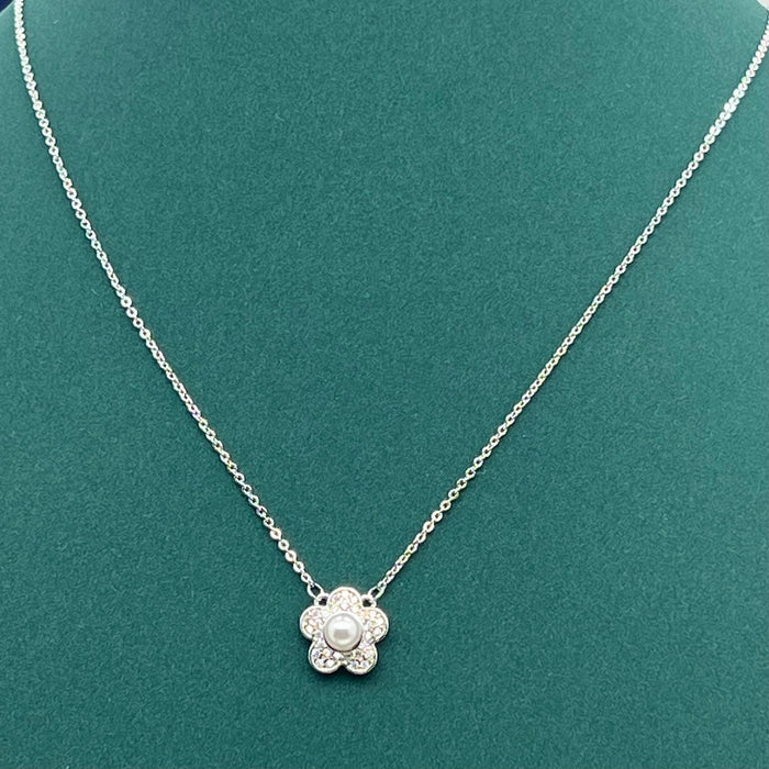 Swarovski Floral Pearl Pendant Necklace  
 Color: Silver with a white crystal pearl and clear crystal pavé