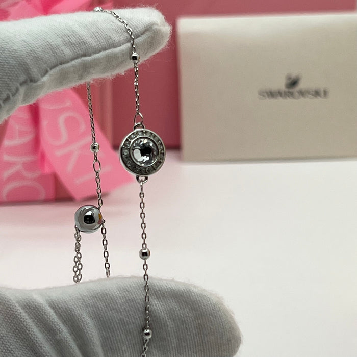Swarovski Crystal Station Bracelet  
 Color: Silver with a Clear Pavé-Framed Crystal