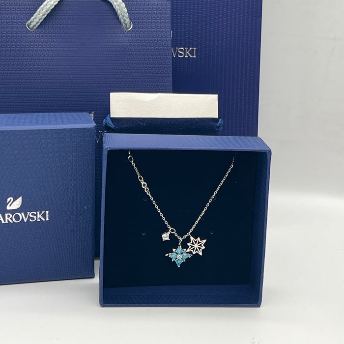 Swarovski Constella or Star Multi-Charm Pendant Necklace  
 Color: Silver with light blue and clear crystals