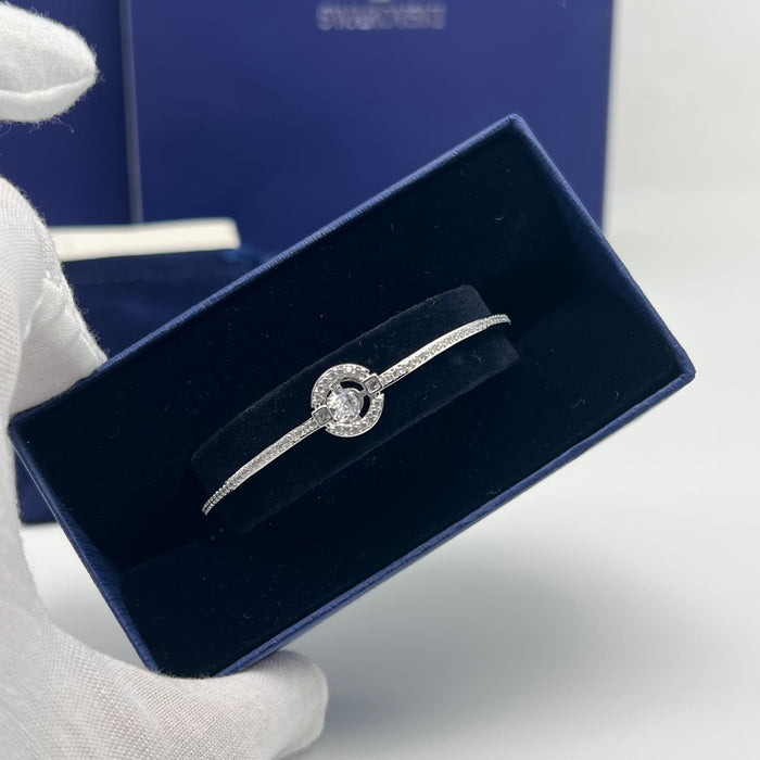 Swarovski Sparkling Dance Bangle (Round / Circular Dancing Stone Design)
 Color: Silver and Clear (white crystals