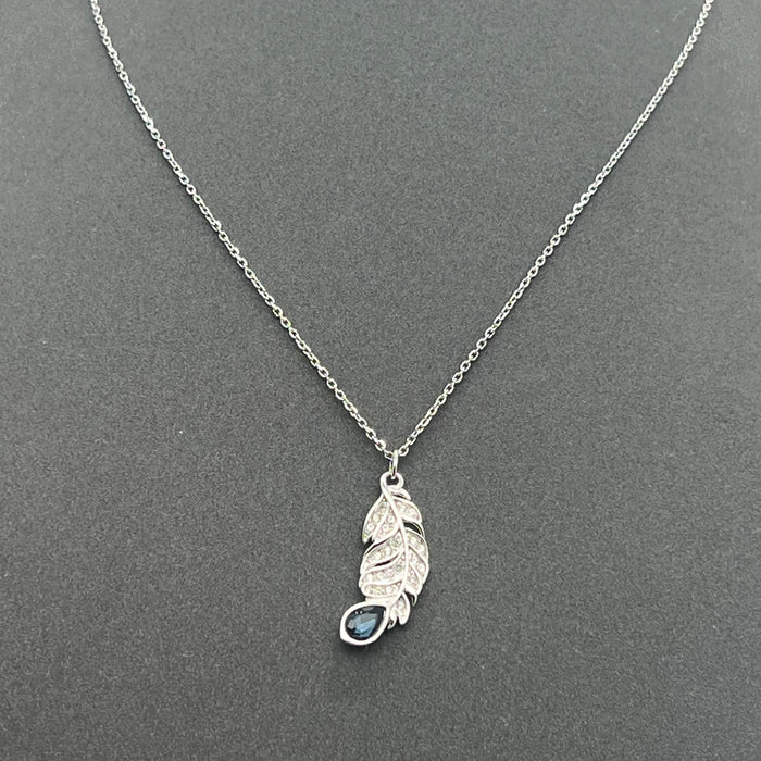 Swarovski Vienna Feather Pendant
 Color: Silver, White, and Dark Blue / Midnight Navy Accents