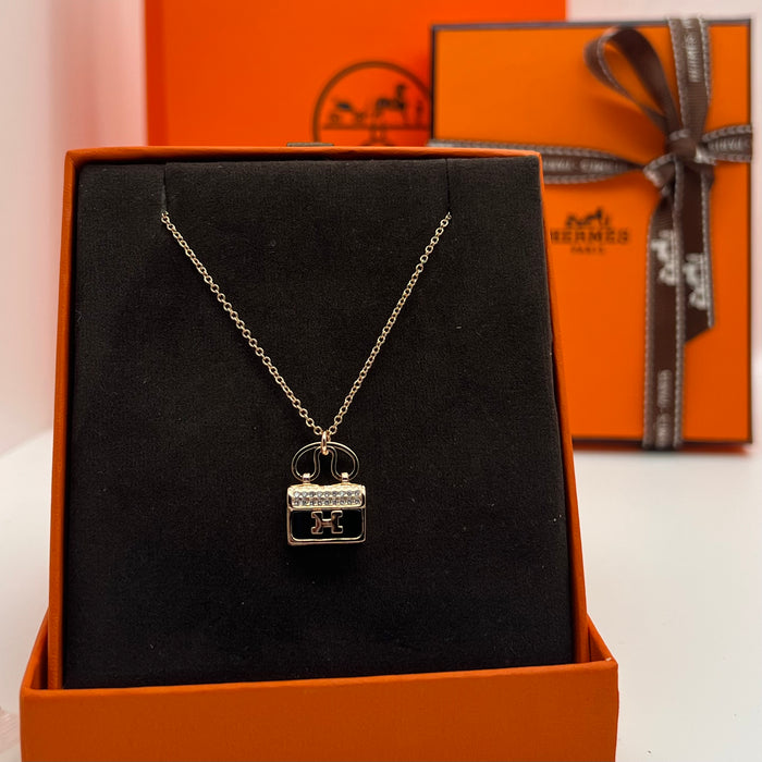 Hermès Amulettes Constance Pendant Necklace  
 Color:green / Black / red/ivory(rose gold tone)