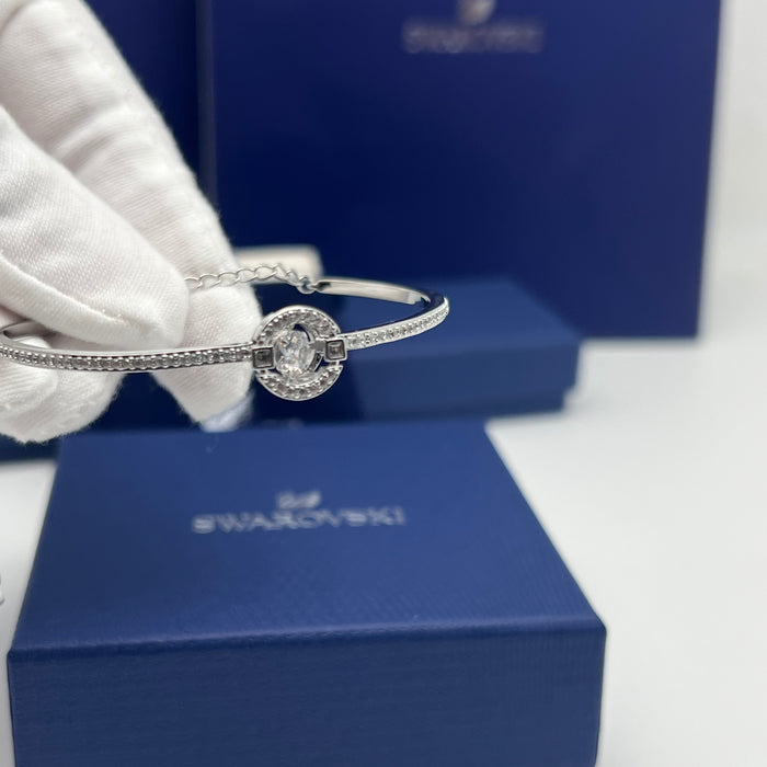 Swarovski Sparkling Dance Bangle (Round / Circular Dancing Stone Design)
 Color: Silver and Clear (white crystals