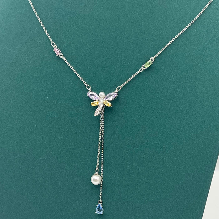 Swarovski Mixed Cuts Dragonfly Y-Necklace  
 Color: Multicolored (Silver-tone chain with pastel pink, purple, yellow, white pearl, and blue crystal accents