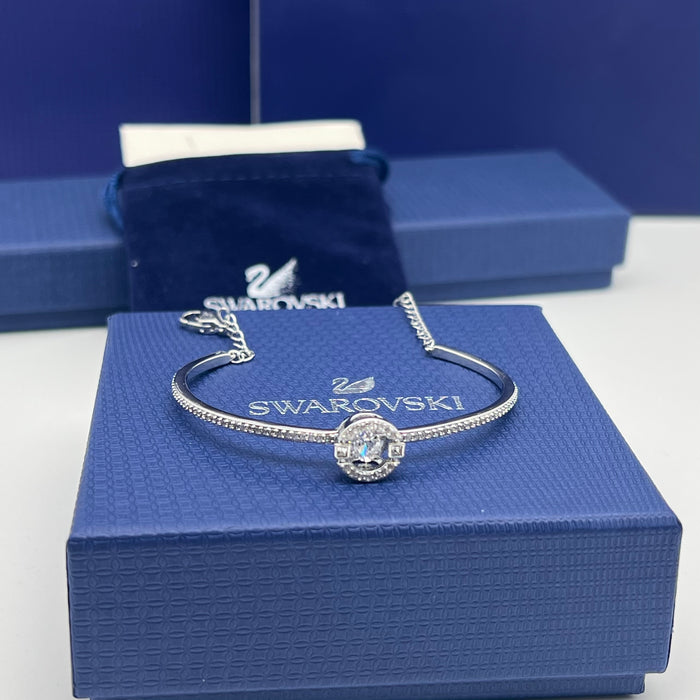 Swarovski Sparkling Dance Bangle (Round / Circular Dancing Stone Design)
 Color: Silver and Clear (white crystals