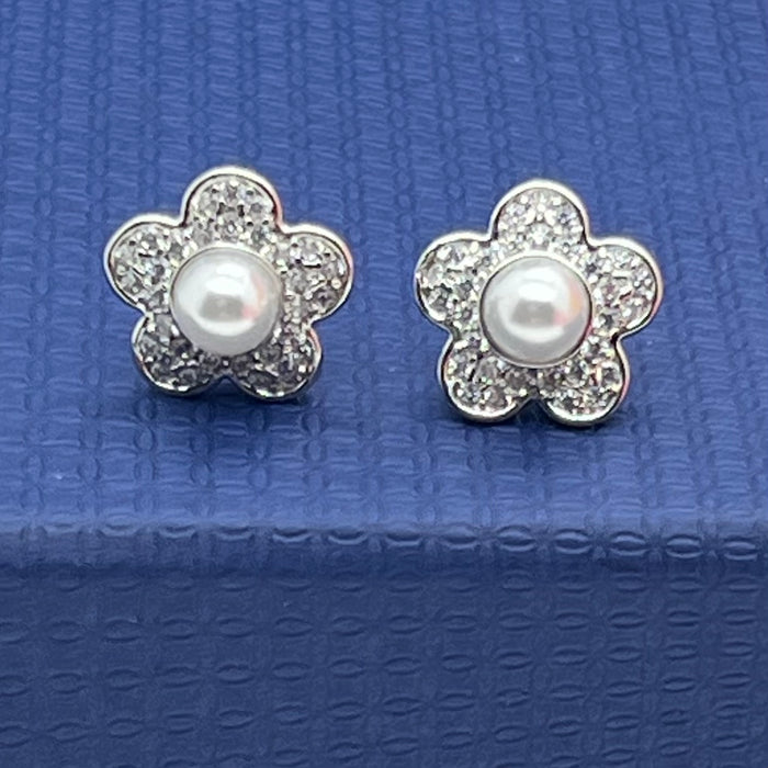 Swarovski Stud Earrings (Flower Design)
 Color: White and Silver (with a white crystal pearl and clear pavé)
