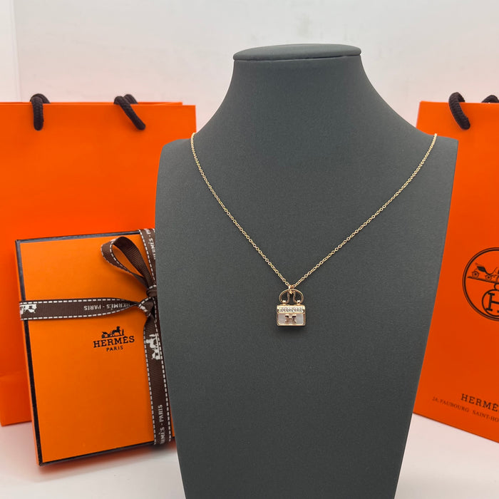 Hermès Amulettes Constance Pendant Necklace  
 Color:green / Black / red/ivory(rose gold tone)