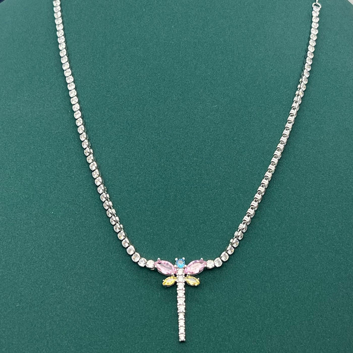 Swarovski Mixed Cuts Dragonfly Tennis Necklace
 Color: Multicolored (Silver-tone chain with clear, pastel pink, purple, yellow, and blue crystal accents)