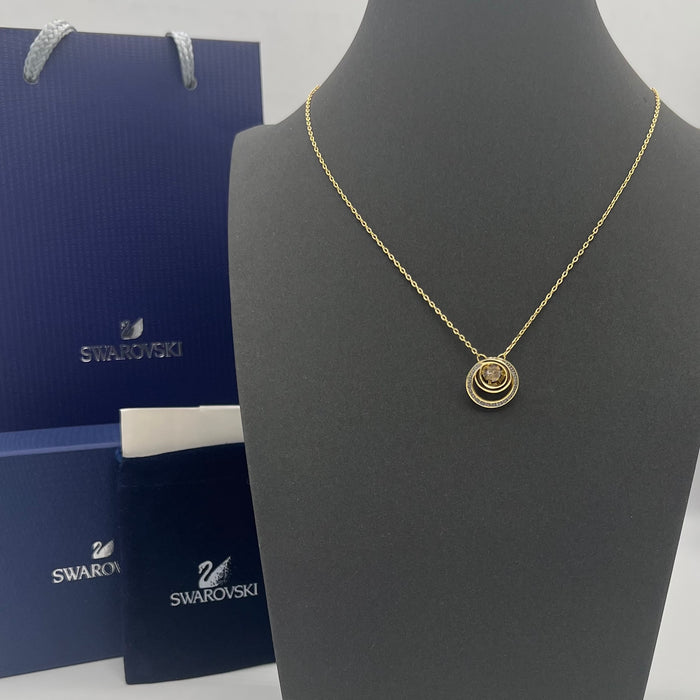 Swarovski Sparkling Dance / Generation Pendant Necklace  
 Color: Gold and Clear / White