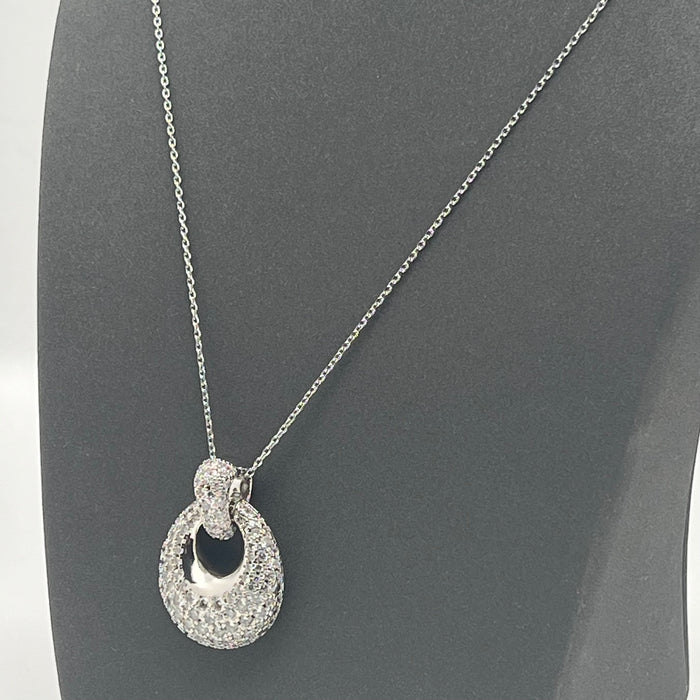 Swarovski Further / Una Pavé Circle Pendant Necklace  
 Color: Silver and Clear